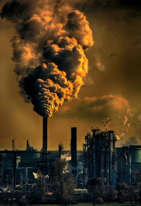 image of a power plant bursting out smoke