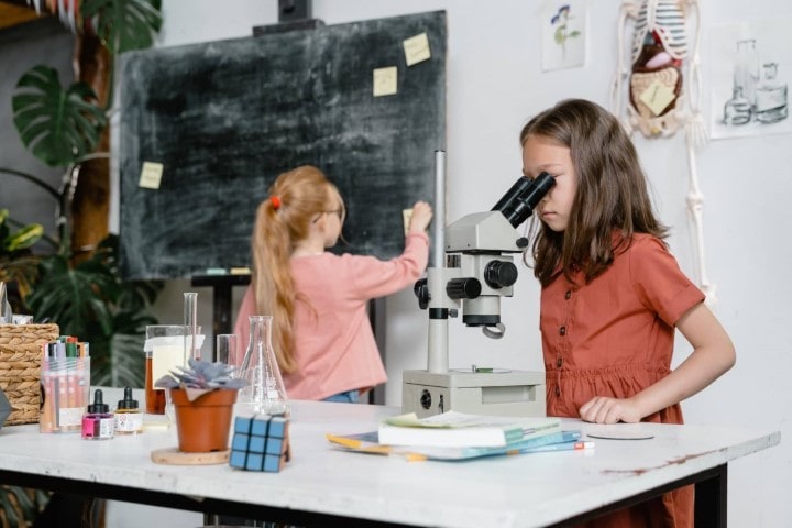 two children having a science project