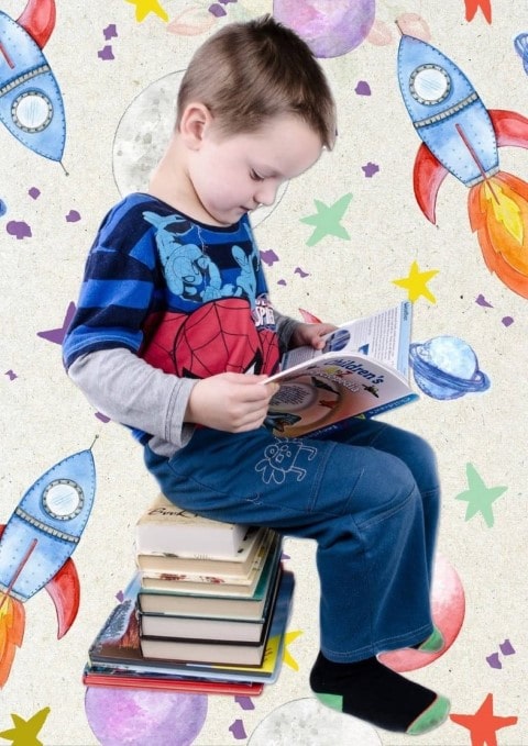 colorful image of a child who reads, sitting on a pile of books