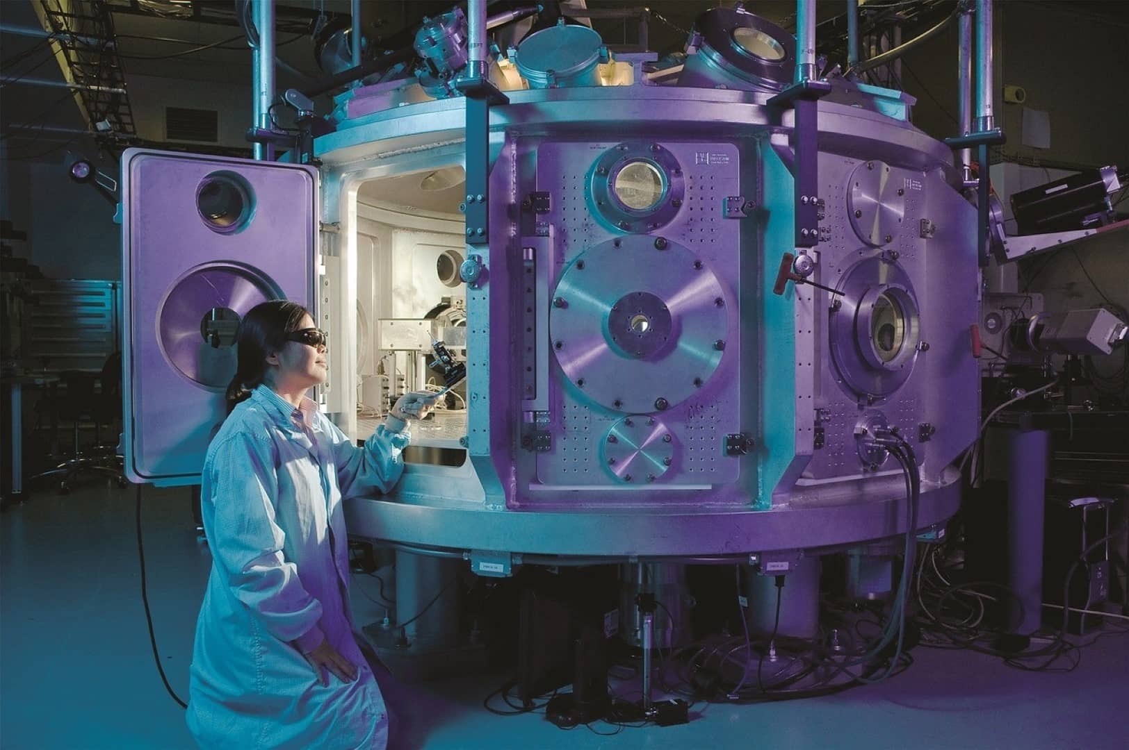 big image of a scientist working on a scientific object