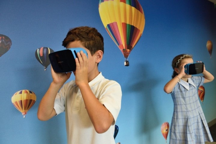 two children using our VR headsets